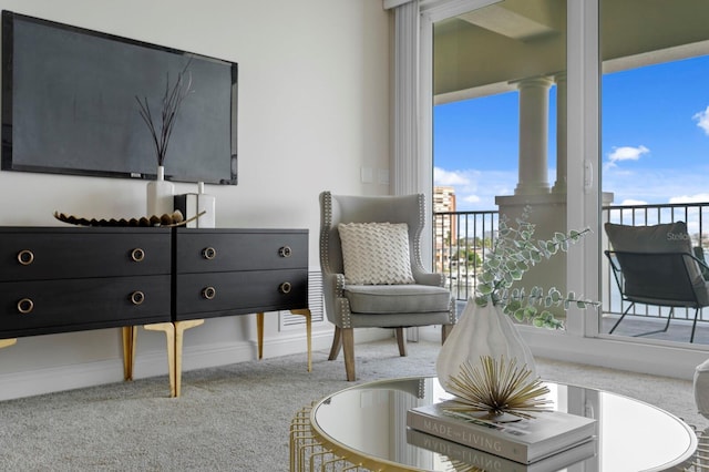 17735 Gulf Blvd Unit 502, Redington Shores, FL 33708 - living room with carpet floors and decorative columns