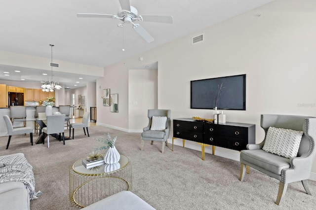 17735 Gulf Blvd Unit 502, Redington Shores, FL 33708 - living room with light carpet, a chandelier, ceiling fan, recessed lighting, and vaulted ceiling