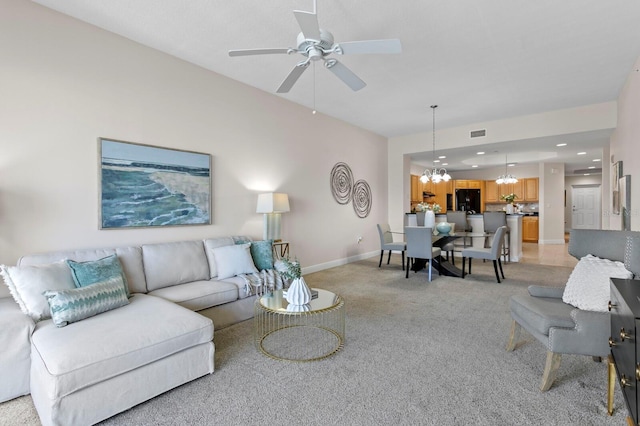 17735 Gulf Blvd Unit 502, Redington Shores, FL 33708 - living room with light colored carpet, a chandelier, ceiling fan, and recessed lighting
