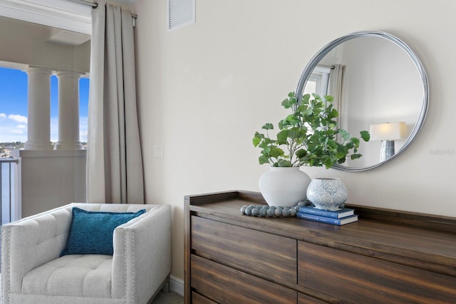 17735 Gulf Blvd Unit 502, Redington Shores, FL 33708 - living area with ornate columns and baseboards