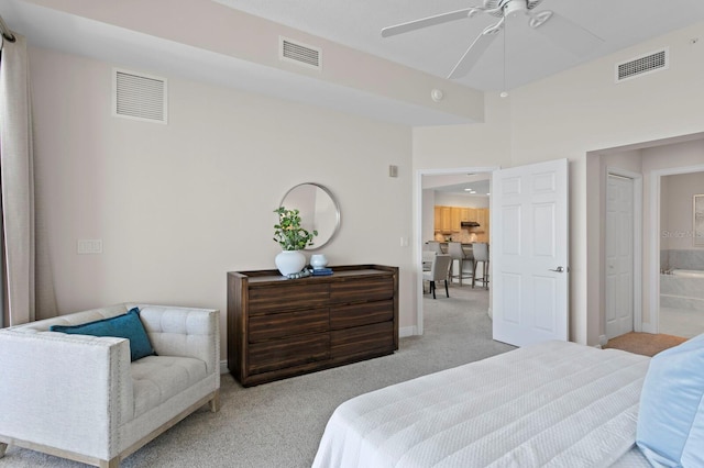 17735 Gulf Blvd Unit 502, Redington Shores, FL 33708 - carpeted bedroom featuring ensuite bathroom and a ceiling fan