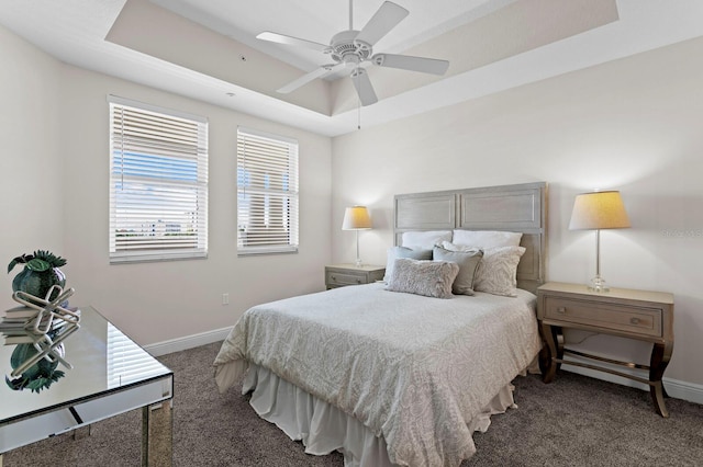 17735 Gulf Blvd Unit 502, Redington Shores, FL 33708 - carpeted bedroom with a tray ceiling and ceiling fan