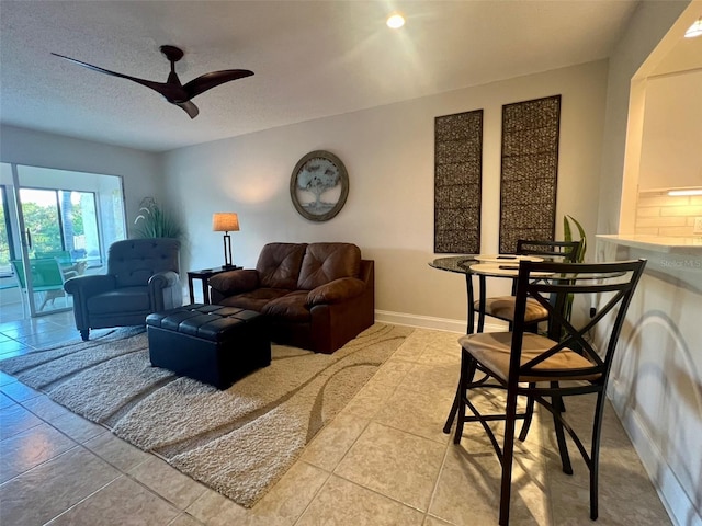 1359 Mission Cir Unit 48A, Clearwater, FL 33759 - living area with a ceiling fan, tile patterned floors, and a textured ceiling