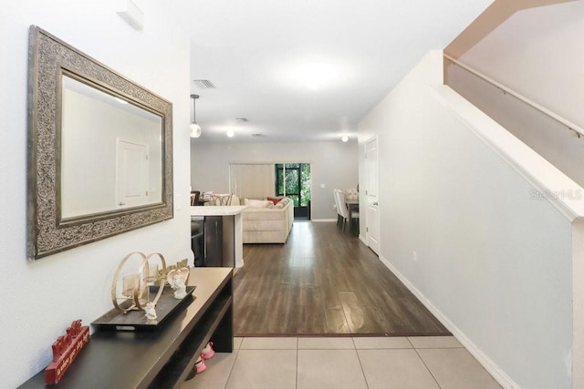 9826 Hound Chase Dr, Gibsonton, FL 33534 - hall featuring tile patterned floors and baseboards