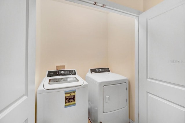 9826 Hound Chase Dr, Gibsonton, FL 33534 - washroom with washer and dryer