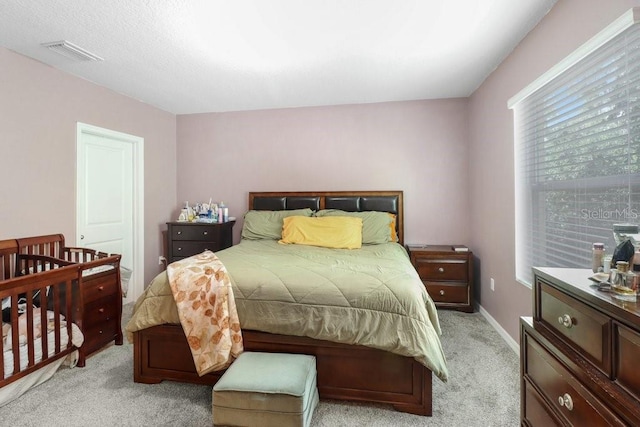 9826 Hound Chase Dr, Gibsonton, FL 33534 - bedroom featuring light carpet and baseboards
