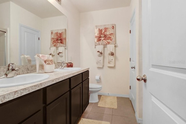 9826 Hound Chase Dr, Gibsonton, FL 33534 - full bathroom with double vanity and tile patterned flooring