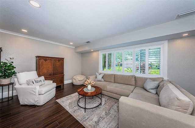 10866 Harborside Dr, Largo, FL 33773 - living room featuring a textured wall, dark wood-style floors, ornamental molding, and recessed lighting