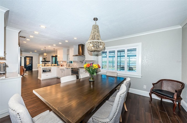 10866 Harborside Dr, Largo, FL 33773 - dining area with a chandelier, dark wood finished floors, crown molding, recessed lighting, and a textured ceiling