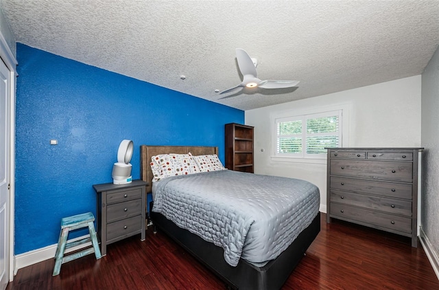 10866 Harborside Dr, Largo, FL 33773 - bedroom featuring wood finished floors, a ceiling fan, and a textured ceiling