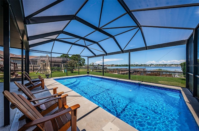 10866 Harborside Dr, Largo, FL 33773 - swimming pool with a water view, a yard, a patio, and glass enclosure