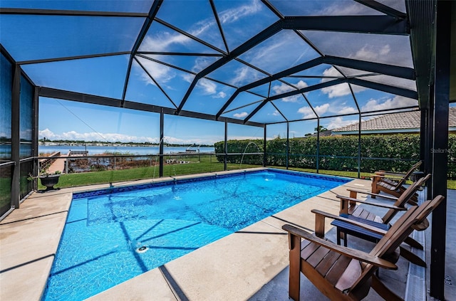 10866 Harborside Dr, Largo, FL 33773 - swimming pool featuring a water view, a patio area, and a lanai