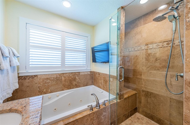 10866 Harborside Dr, Largo, FL 33773 - full bathroom with a stall shower, a tub with jets, and recessed lighting
