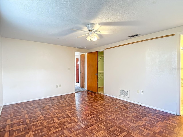 6250 7th Ave, New Port Richey, FL 34653 - unfurnished room featuring ceiling fan and a textured ceiling