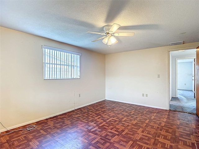 6250 7th Ave, New Port Richey, FL 34653 - unfurnished room featuring a ceiling fan and a textured ceiling