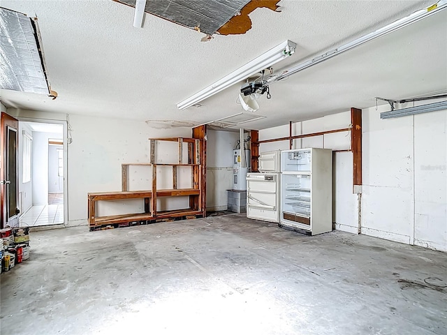 6250 7th Ave, New Port Richey, FL 34653 - garage featuring electric water heater and a garage door opener