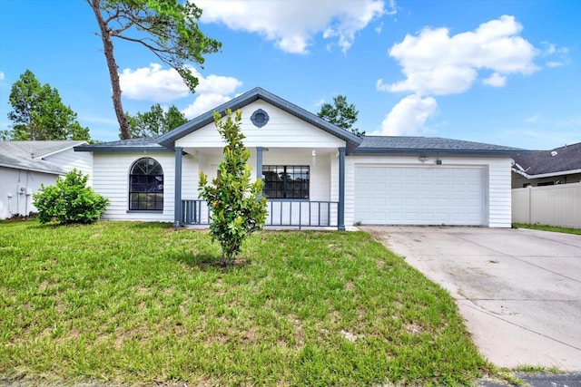 10319 Alberta Ct, New Port Richey, FL 34654 - single story home with concrete driveway, an attached garage, and covered porch