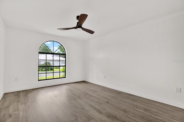 10319 Alberta Ct, New Port Richey, FL 34654 - empty room featuring wood finished floors and ceiling fan
