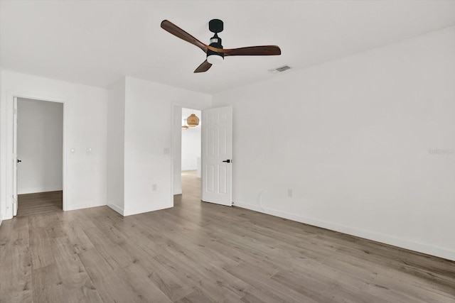 10319 Alberta Ct, New Port Richey, FL 34654 - spare room with wood finished floors and a ceiling fan