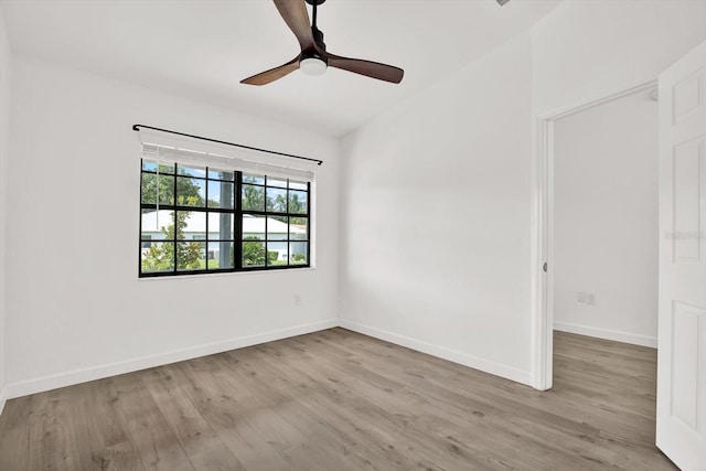 10319 Alberta Ct, New Port Richey, FL 34654 - unfurnished room with light wood finished floors and ceiling fan