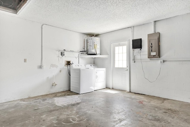 10319 Alberta Ct, New Port Richey, FL 34654 - garage featuring electric panel, electric water heater, and washer and clothes dryer