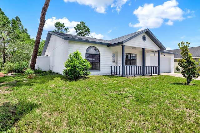 10319 Alberta Ct, New Port Richey, FL 34654 - ranch-style house with a front lawn, a garage, a porch, and concrete driveway