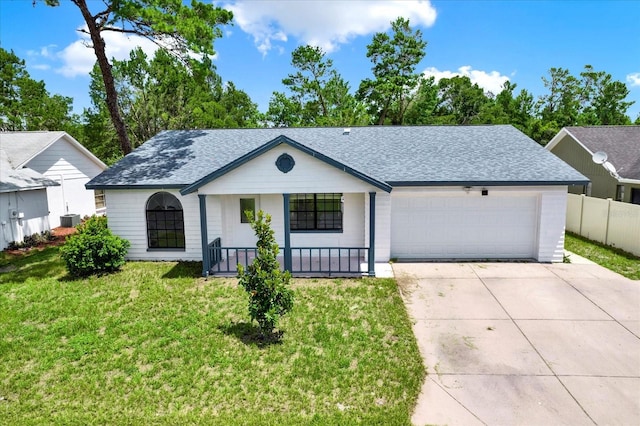 10319 Alberta Ct, New Port Richey, FL 34654 - view of front of property featuring concrete driveway, an attached garage, covered porch, and roof with shingles