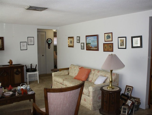 7534 Betula Dr, New Port Richey, FL 34653 - carpeted living room featuring a textured ceiling