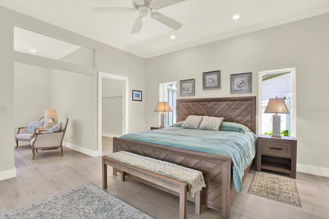 11890 Walker Ave, Seminole, FL 33772 - bedroom featuring light wood-style flooring, a walk in closet, ceiling fan, and recessed lighting