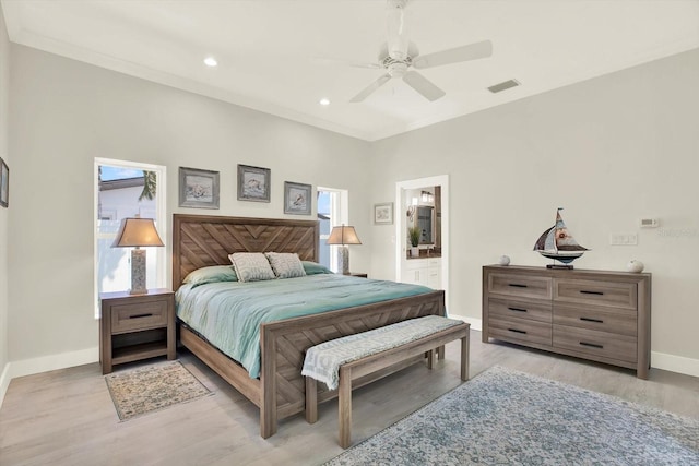 11890 Walker Ave, Seminole, FL 33772 - bedroom featuring light wood-type flooring, recessed lighting, connected bathroom, and ceiling fan