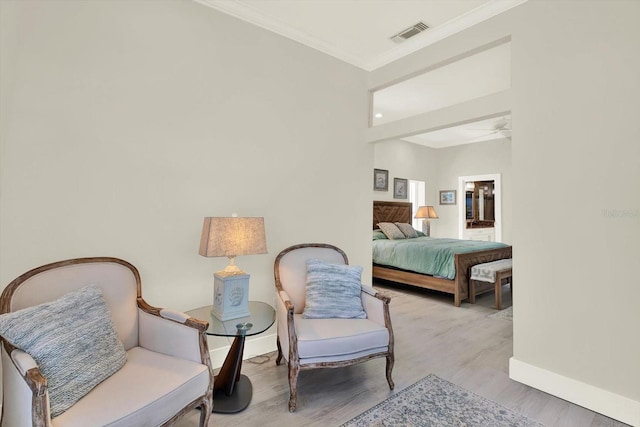 11890 Walker Ave, Seminole, FL 33772 - bedroom featuring wood finished floors and ornamental molding