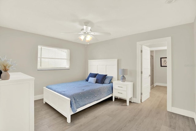 11890 Walker Ave, Seminole, FL 33772 - bedroom featuring light wood-style flooring and a ceiling fan