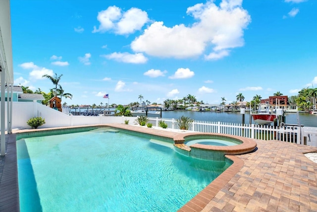 11890 Walker Ave, Seminole, FL 33772 - view of pool with a water view, a fenced backyard, a pool with connected hot tub, and a patio