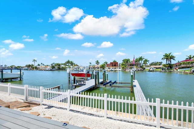 11890 Walker Ave, Seminole, FL 33772 - dock area featuring boat lift and a water view