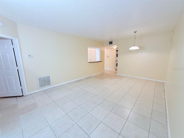6448 Cypressdale Dr Unit 101, Riverview, FL 33578 - unfurnished room with light tile patterned floors and a smoke detector
