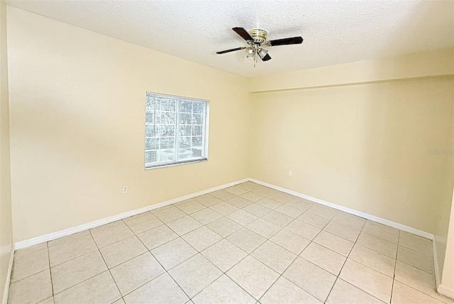 6448 Cypressdale Dr Unit 101, Riverview, FL 33578 - unfurnished room with a textured ceiling, a ceiling fan, and light tile patterned floors