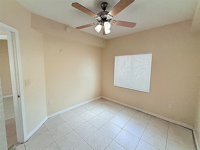 6448 Cypressdale Dr Unit 101, Riverview, FL 33578 - unfurnished room with ceiling fan, light tile patterned flooring, and a smoke detector