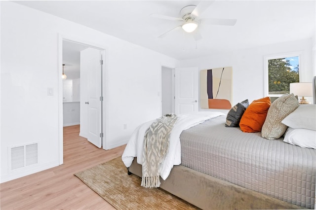 13344 Sorrento Dr, Largo, FL 33774 - bedroom featuring light wood finished floors and a ceiling fan
