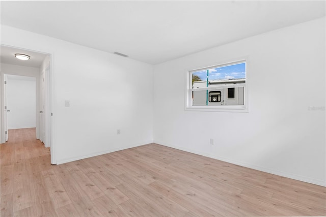 13344 Sorrento Dr, Largo, FL 33774 - unfurnished room with light wood-style floors