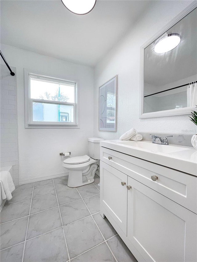 13344 Sorrento Dr, Largo, FL 33774 - full bath with vanity, shower / tub combo, and marble finish floors