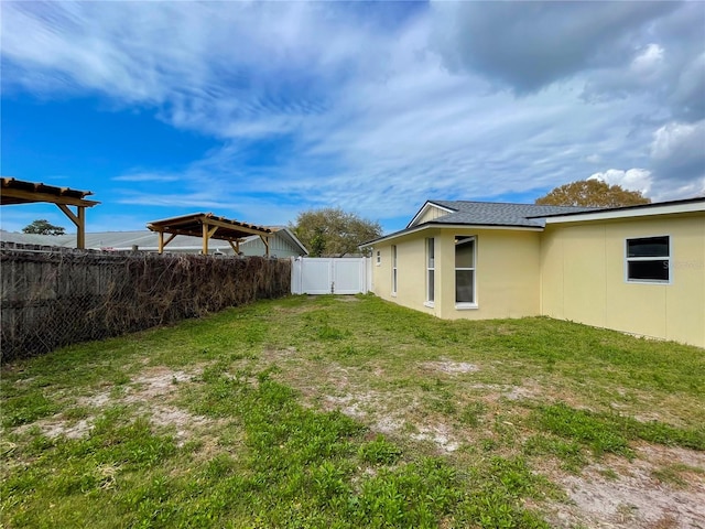 13344 Sorrento Dr, Largo, FL 33774 - fenced backyard featuring a pergola
