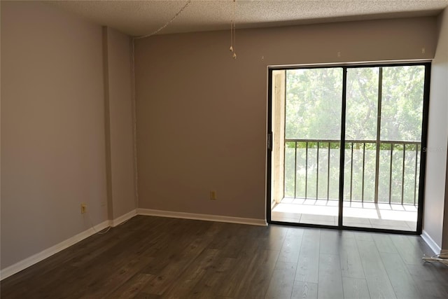 2800 Cove Cay Dr Unit 5D, Clearwater, FL 33760 - empty room with wood finished floors and baseboards
