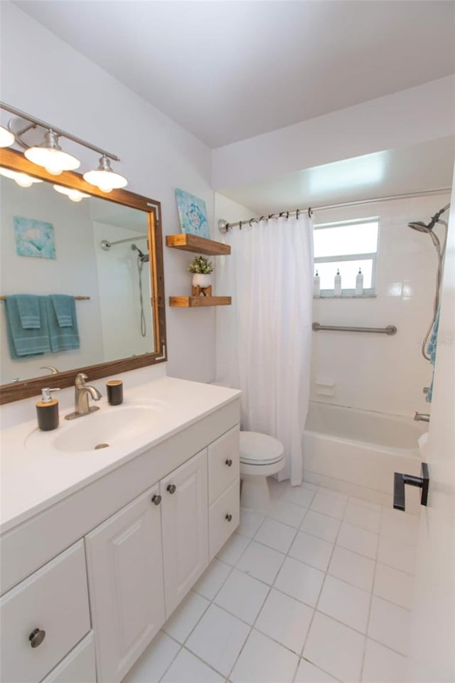 574 6th Ave SE, Largo, FL 33771 - full bath with shower / bath combination with curtain, vanity, and tile patterned floors
