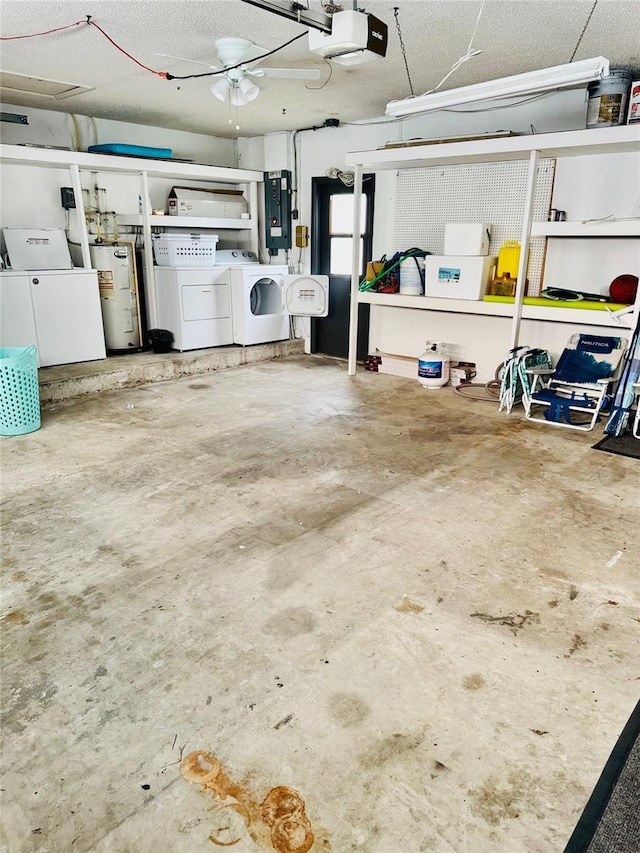 574 6th Ave SE, Largo, FL 33771 - garage with water heater, washer and dryer, electric panel, a garage door opener, and ceiling fan