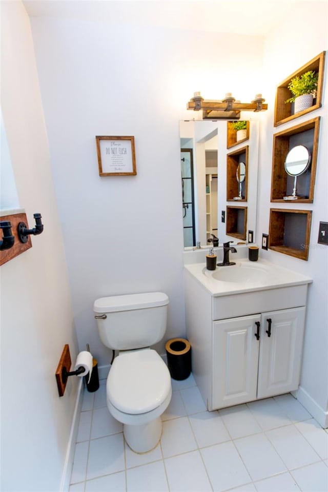 574 6th Ave SE, Largo, FL 33771 - half bath with vanity and tile patterned floors