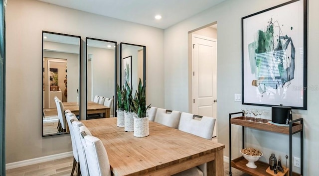 2128 Babbling Brook Blvd, Auburndale, FL 33823 - dining space featuring recessed lighting and light wood-type flooring