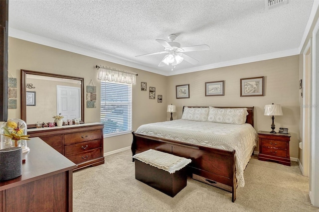 1150 Jade E Ln, Kissimmee, FL 34744 - bedroom featuring light carpet, ornamental molding, a textured ceiling, and a ceiling fan