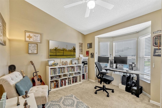 1150 Jade E Ln, Kissimmee, FL 34744 - carpeted home office featuring lofted ceiling, a textured ceiling, and a ceiling fan