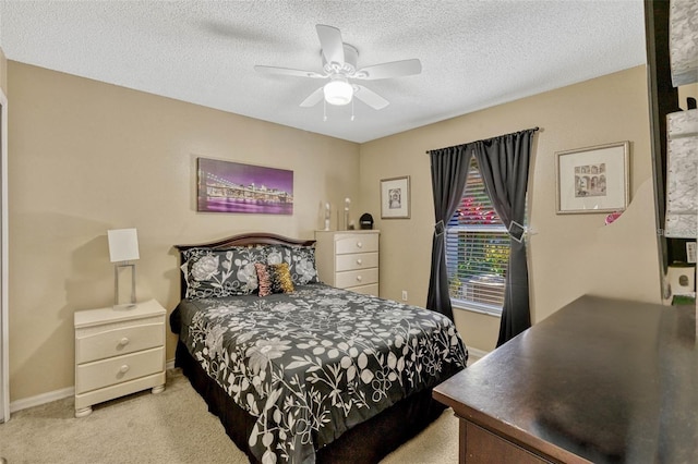 1150 Jade E Ln, Kissimmee, FL 34744 - bedroom featuring carpet floors, a textured ceiling, and a ceiling fan