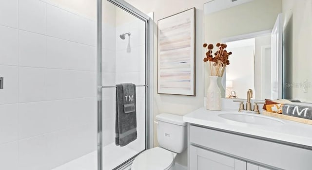 2422 Babbling Brook Blvd, Auburndale, FL 33823 - bathroom featuring vanity and a shower stall